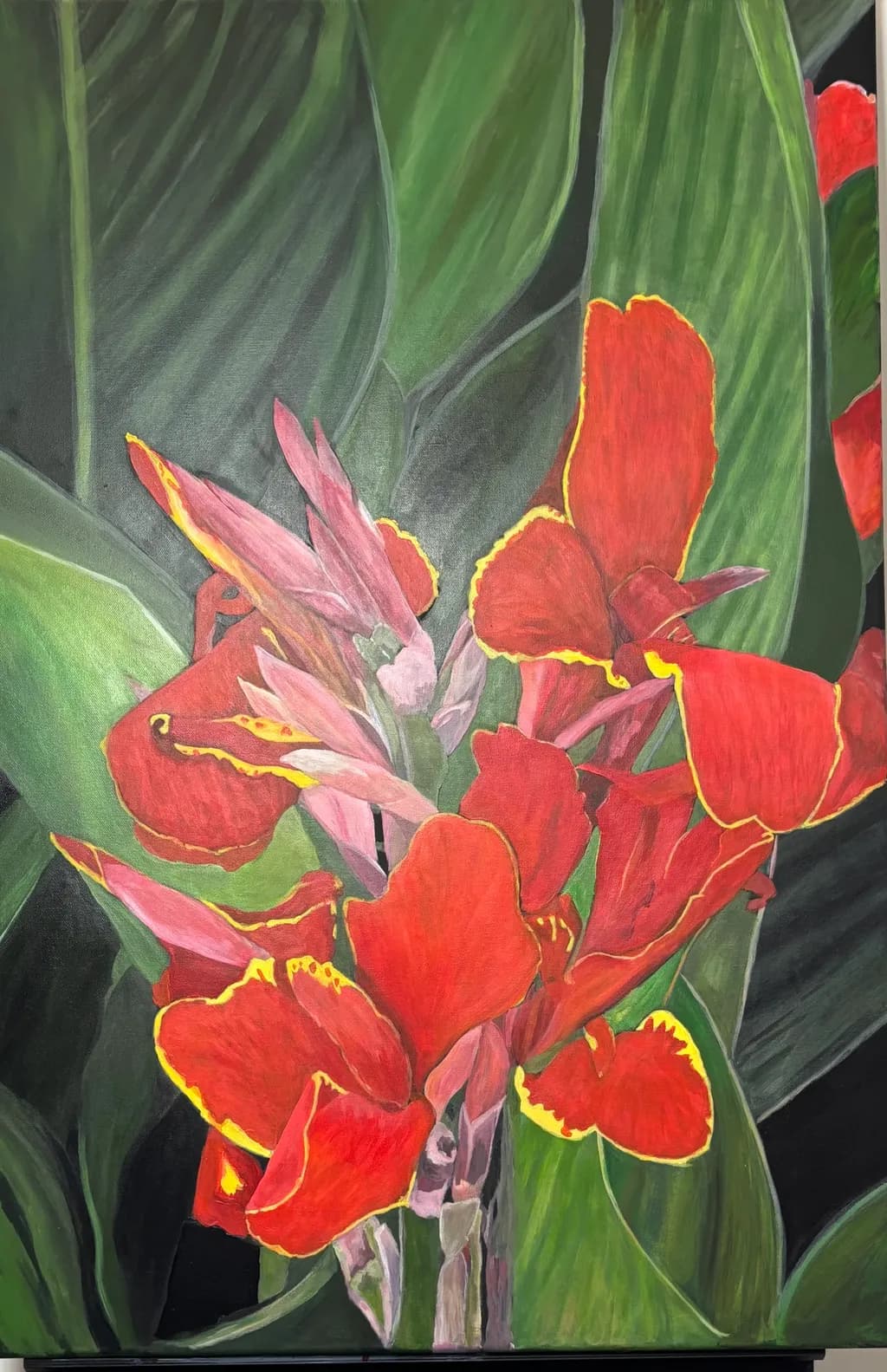 Vibrant Red Canna Blooms Amidst Lush Green Leaves: A Celebration of Nature's Beauty