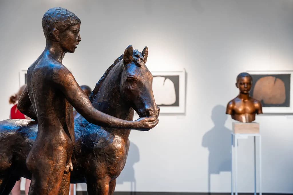 Harmony in Bronze: A Boy and His Horse Sculpture Capturing the Essence of Connection and Nature