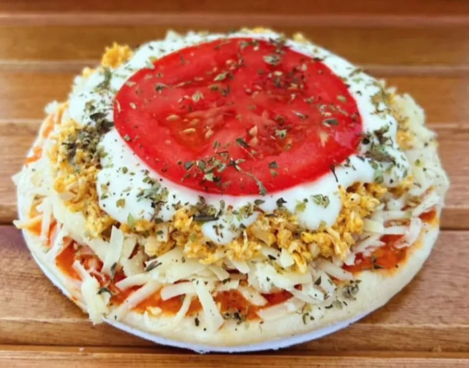 Savory Symphony: A Whimsical Tomato and Herb Delight on a Crispy Base