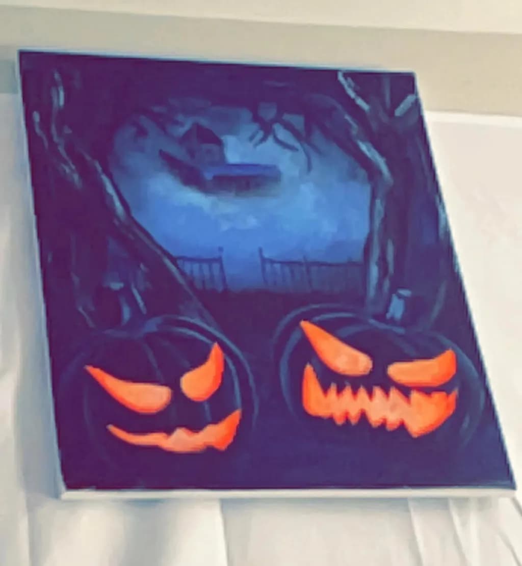 Haunting Glow: A Spooky Halloween Night with Jack-o'-Lanterns and Eerie Shadows