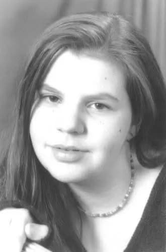 Whispers of Serenity: A Black-and-White Portrait of Youthful Expression