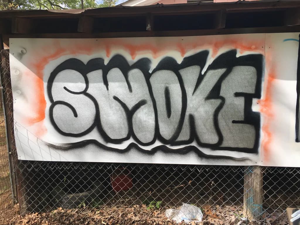 Urban Whispers: The Art of Smoke in Graffiti Form