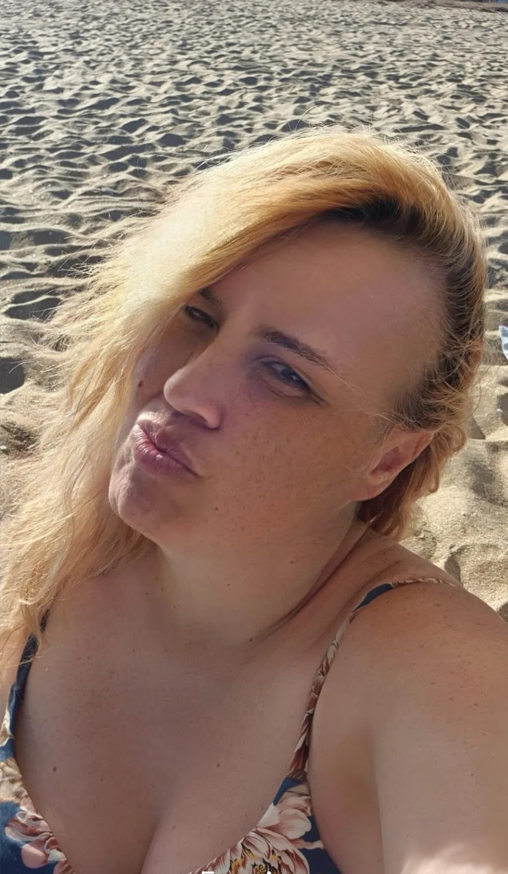 Sun-Kissed Serenity: A Moment of Reflection on the Beach
