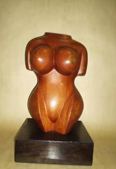 Elegant Curves: A Handcrafted Wooden Torso Sculpture Celebrating the Female Form