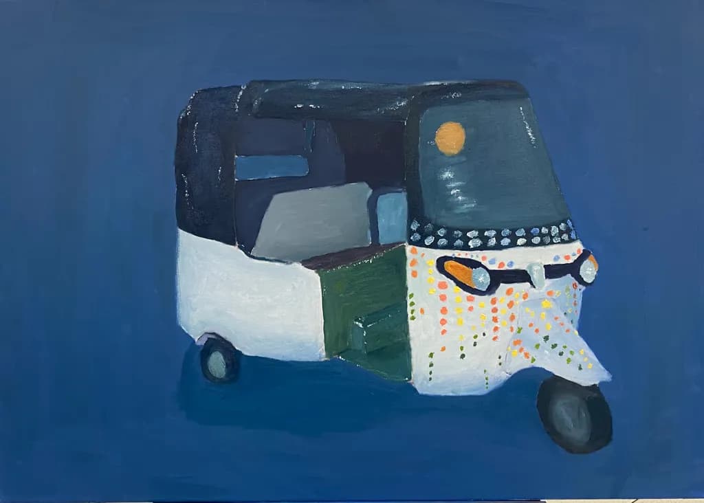 Vibrant Journey: A Colorful Tuk-Tuk in Motion