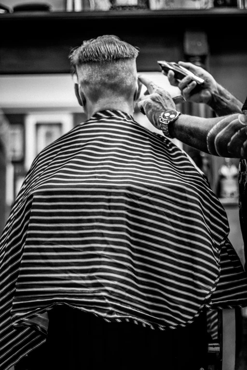 Barber's Craft: A Moment of Transformation in Black and White