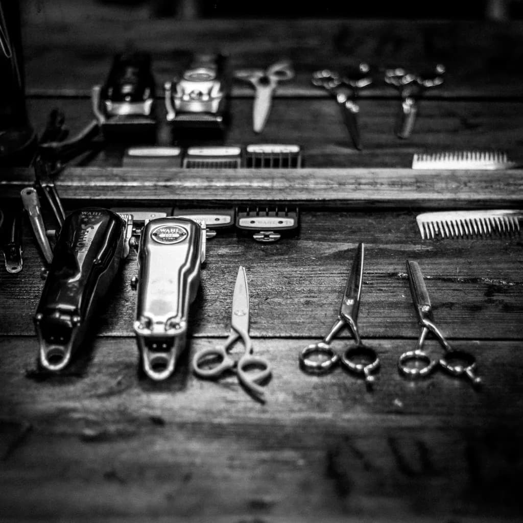 Artistry in Tools: A Black and White Tribute to the Barber's Workspace