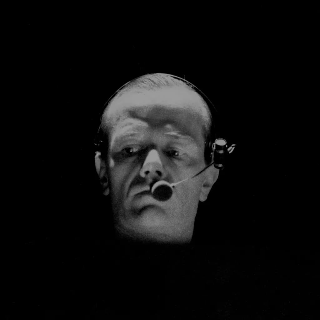 Monochrome Reflections: The Serious Gaze of Technology's Shadow