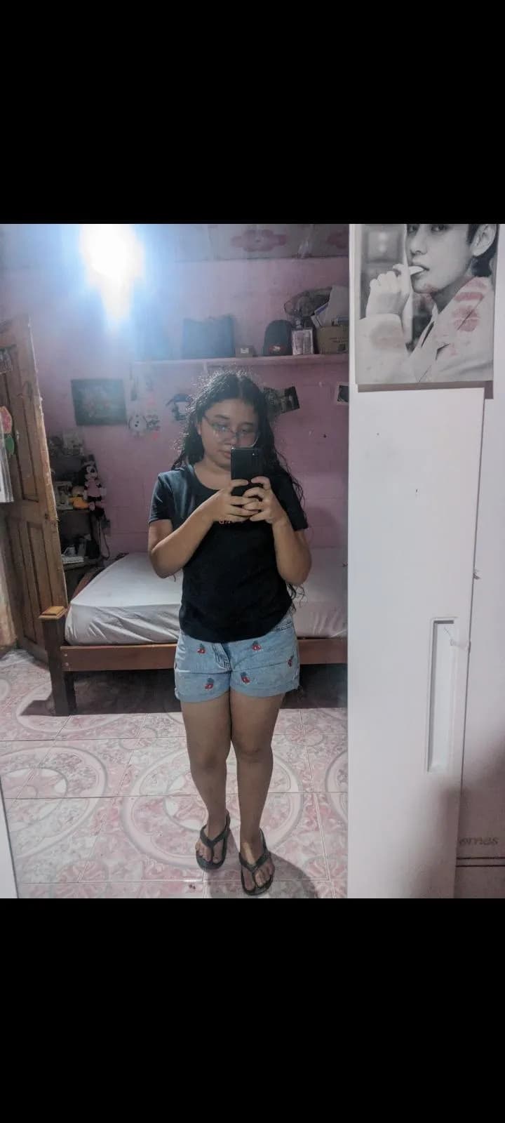 Reflections of Youth: A Candid Moment in a Personal Space