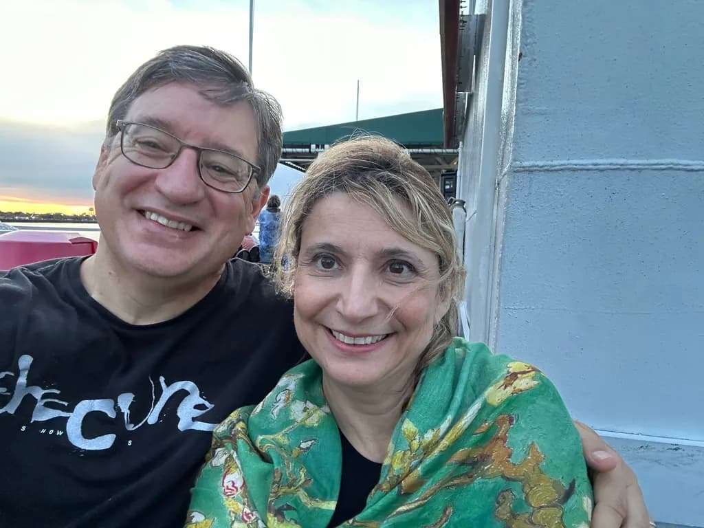 Joyful Evening Embrace: A Portrait of Love and Laughter in a Scenic Setting