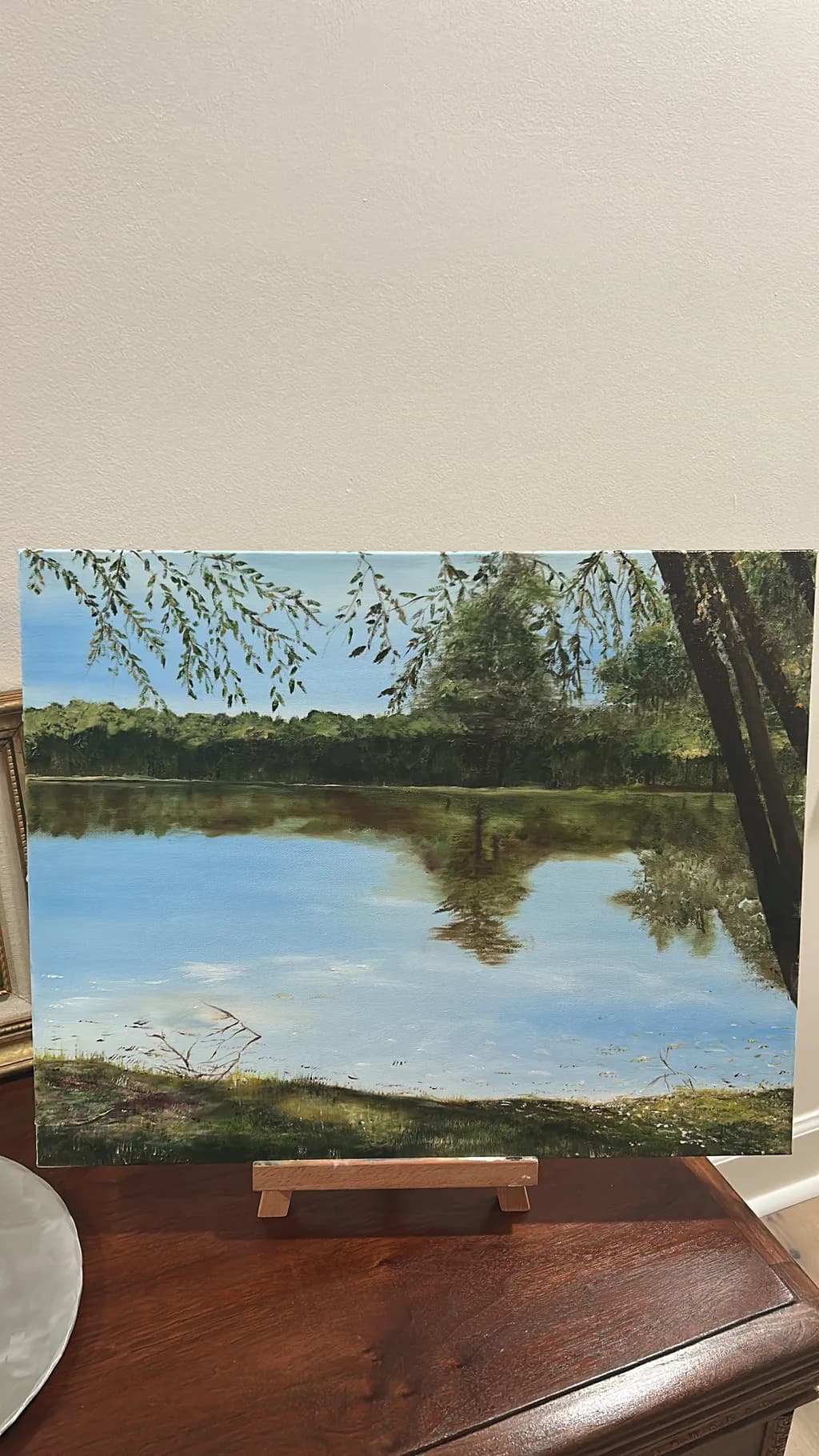 Serenity Reflected: A Tranquil Lakeside Landscape in Soft Hues