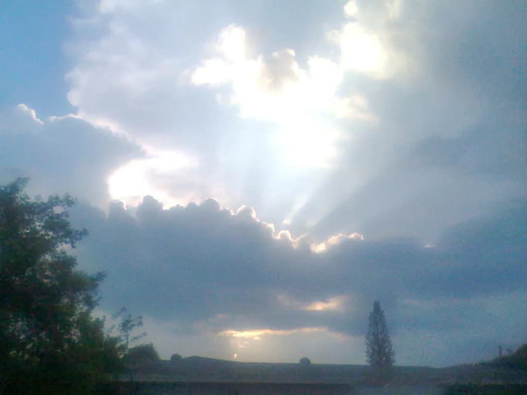 Serenity in the Sky: A Dramatic Landscape of Light and Clouds