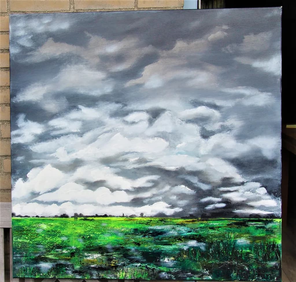 Whispers of Stormy Skies: A Lush Green Landscape in Transition
