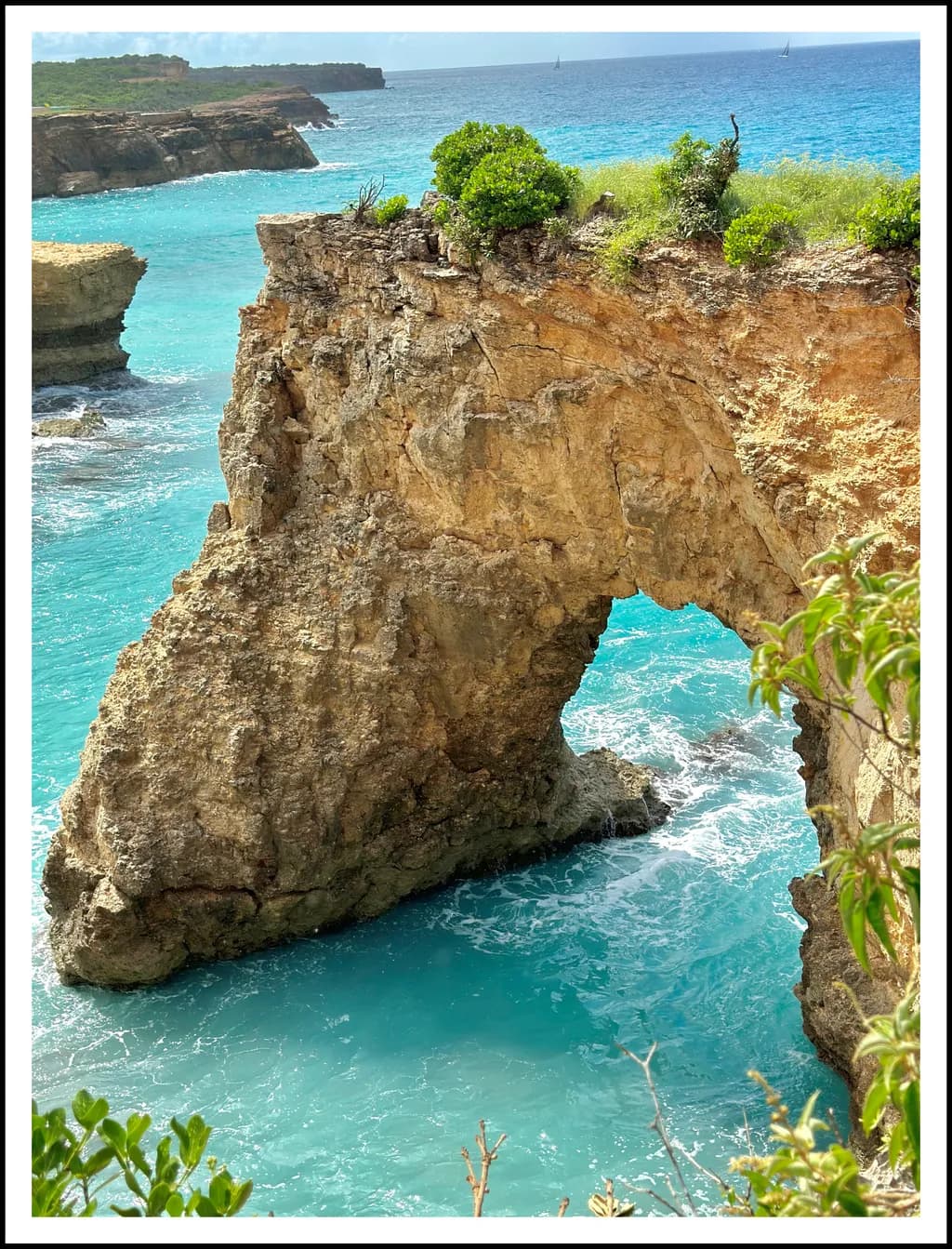Ocean's Embrace: The Serene Arch of Nature's Masterpiece