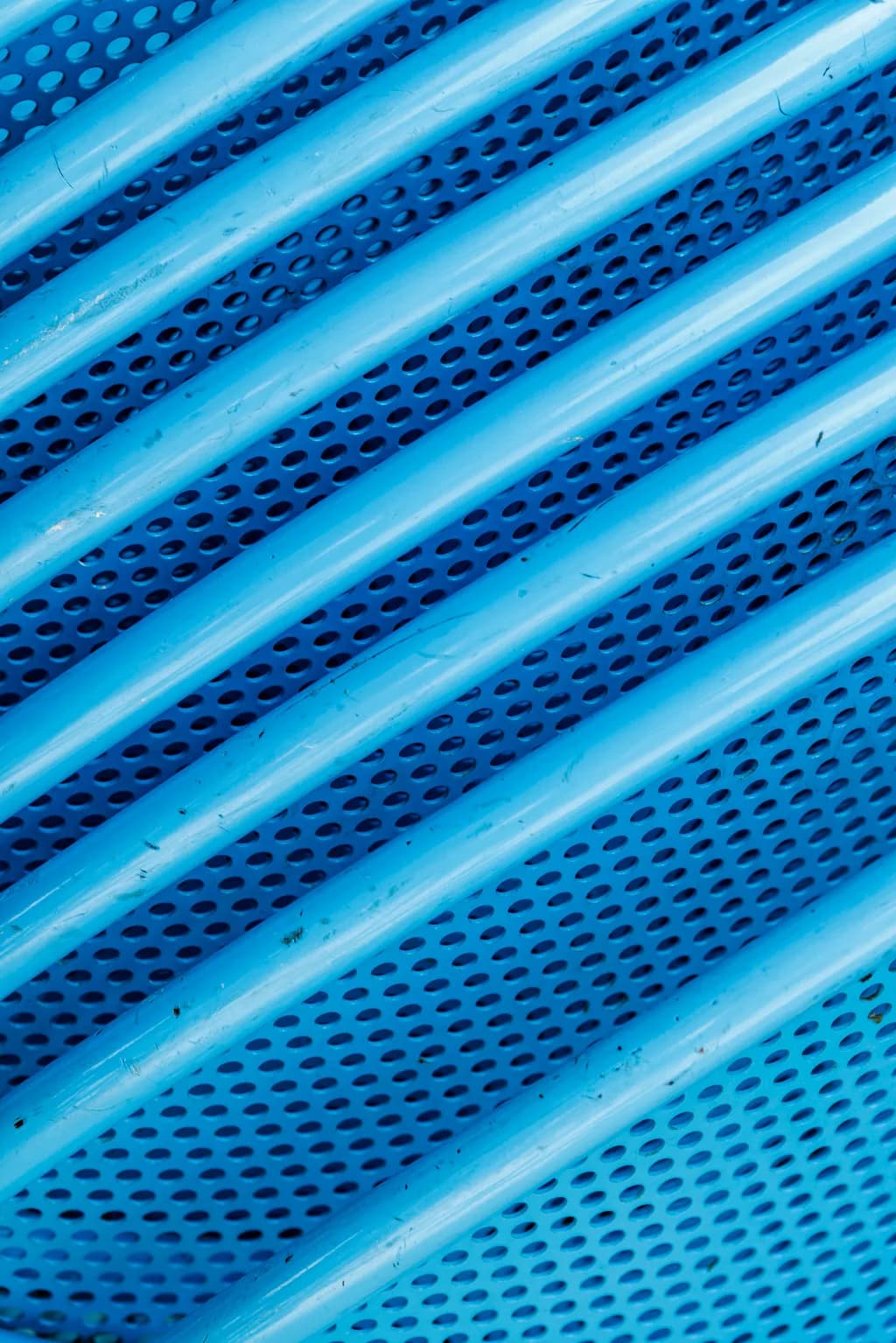 Blue Harmony: A Dance of Curves and Holes in Modern Design