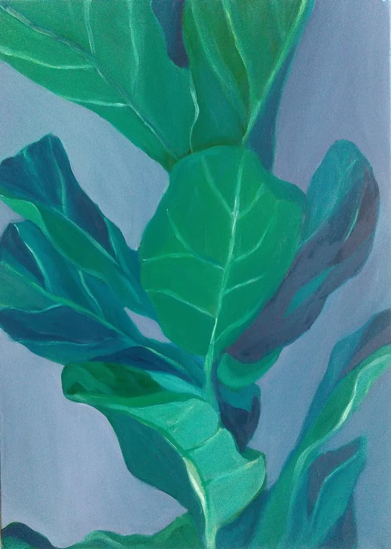 Lush Serenity: A Vibrant Exploration of Green Leaves Against a Soft Blue Background