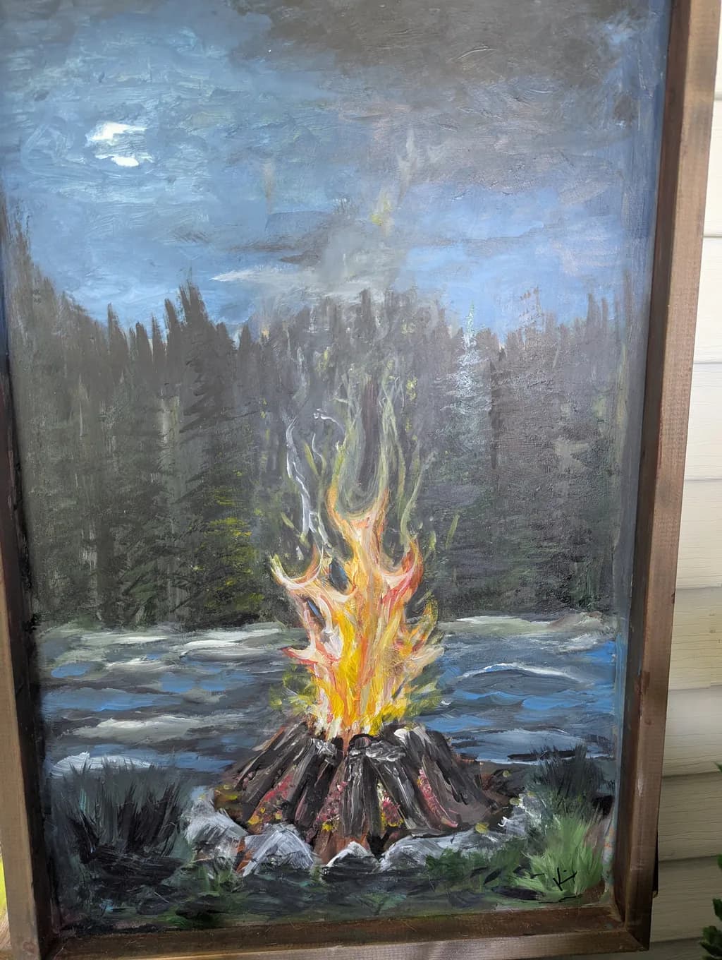 Embers Under the Moonlight: A Serene Night Landscape with Fire and Water