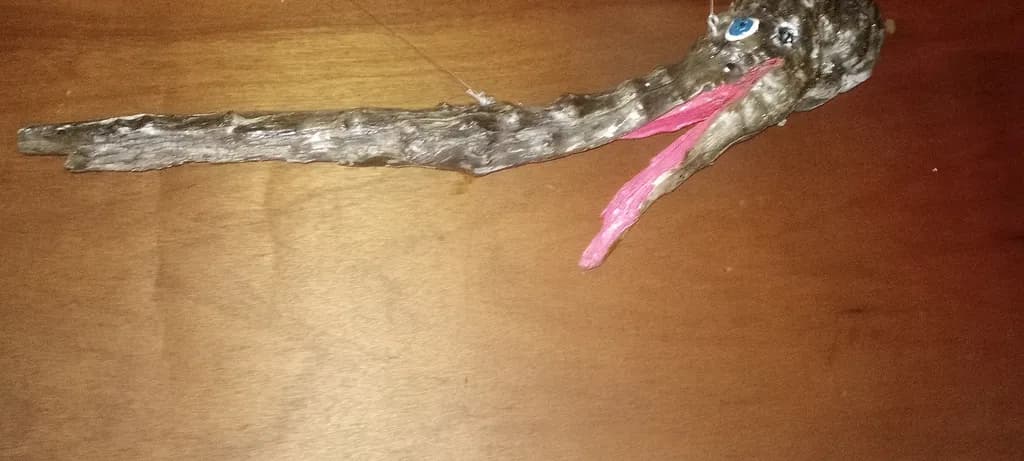 Whimsical Driftwood Serpent: A Unique Handcrafted Art Piece