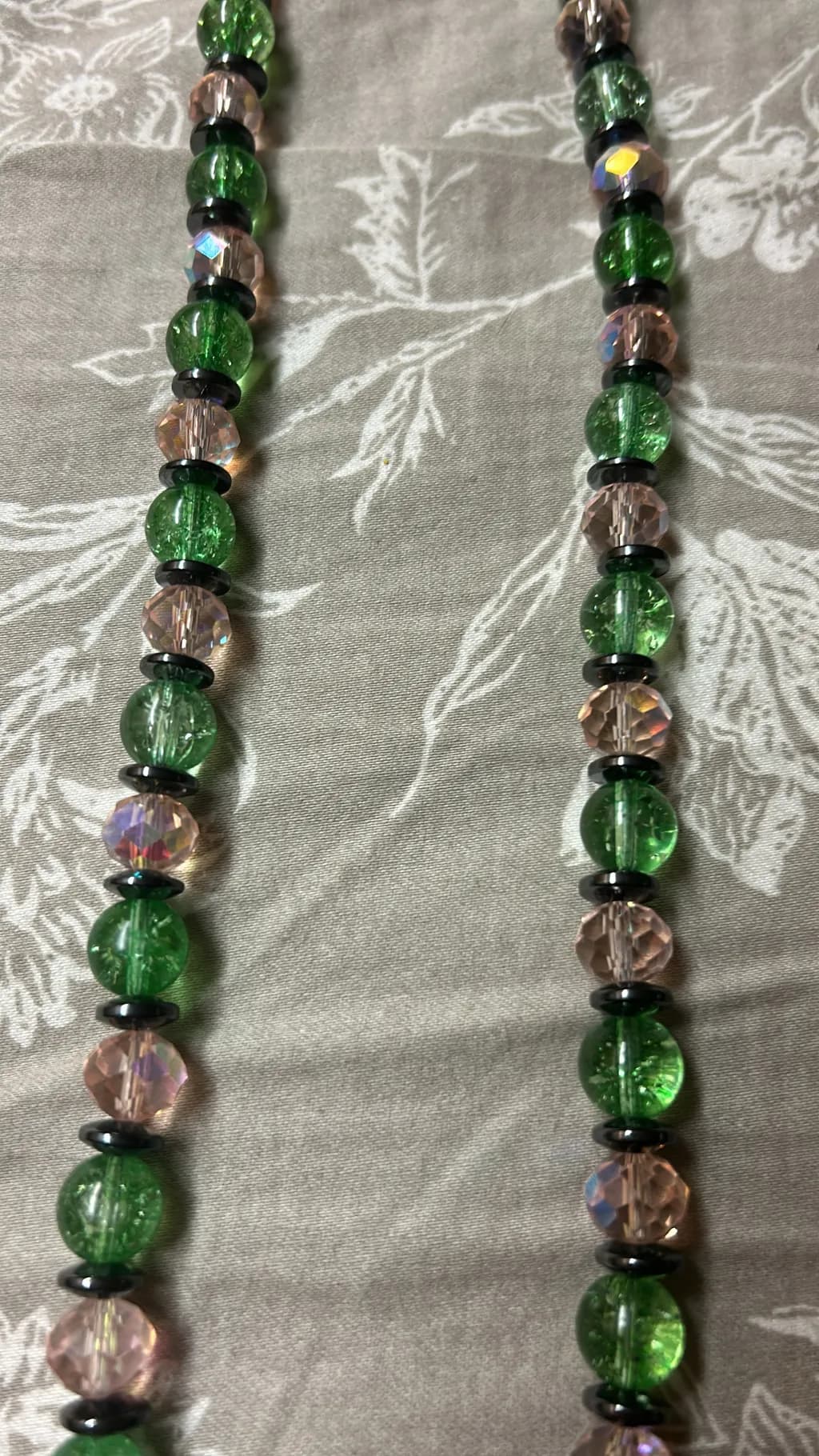 Emerald Dreams: A Shimmering Dance of Green and Pink Beads