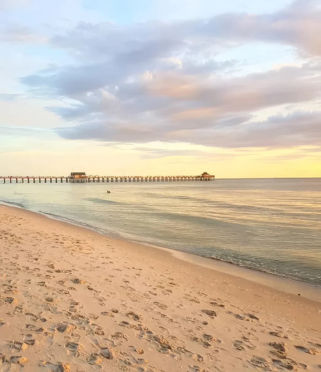 Tranquil Sunset Over the Pier: A Serene Beach Escape