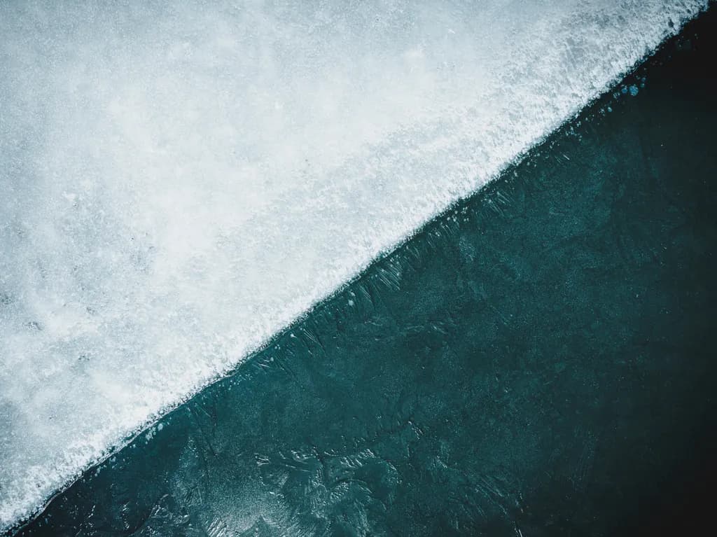 Frozen Serenity: The Tranquil Divide of Ice and Water