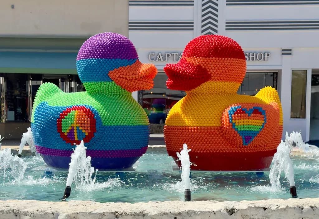 Colorful Harmony: A Playful Encounter of Whimsical Rubber Ducks in a Fountain Display