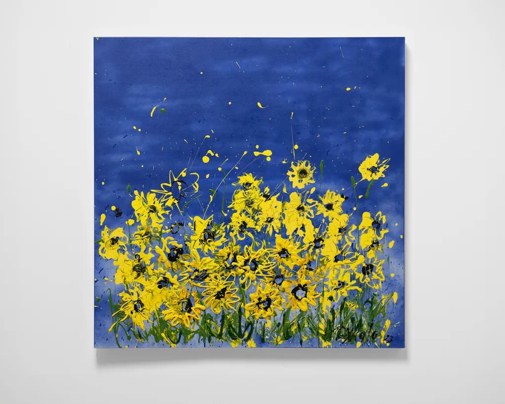 Golden Blooms Against a Deep Blue Sky: A Vibrant Floral Expression