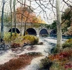 Whispers of Autumn: A Serene Bridge Over Tranquil Waters