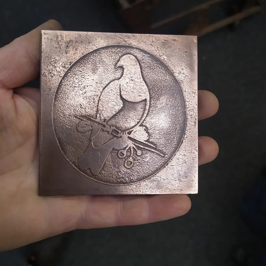 Elegant Copper Bird Emblem: A Captivating Fusion of Nature and Artistry
