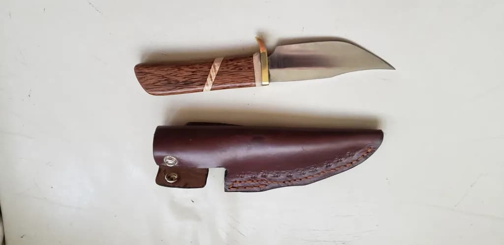 Handcrafted Elegance: Artisan Knife with Leather Sheath