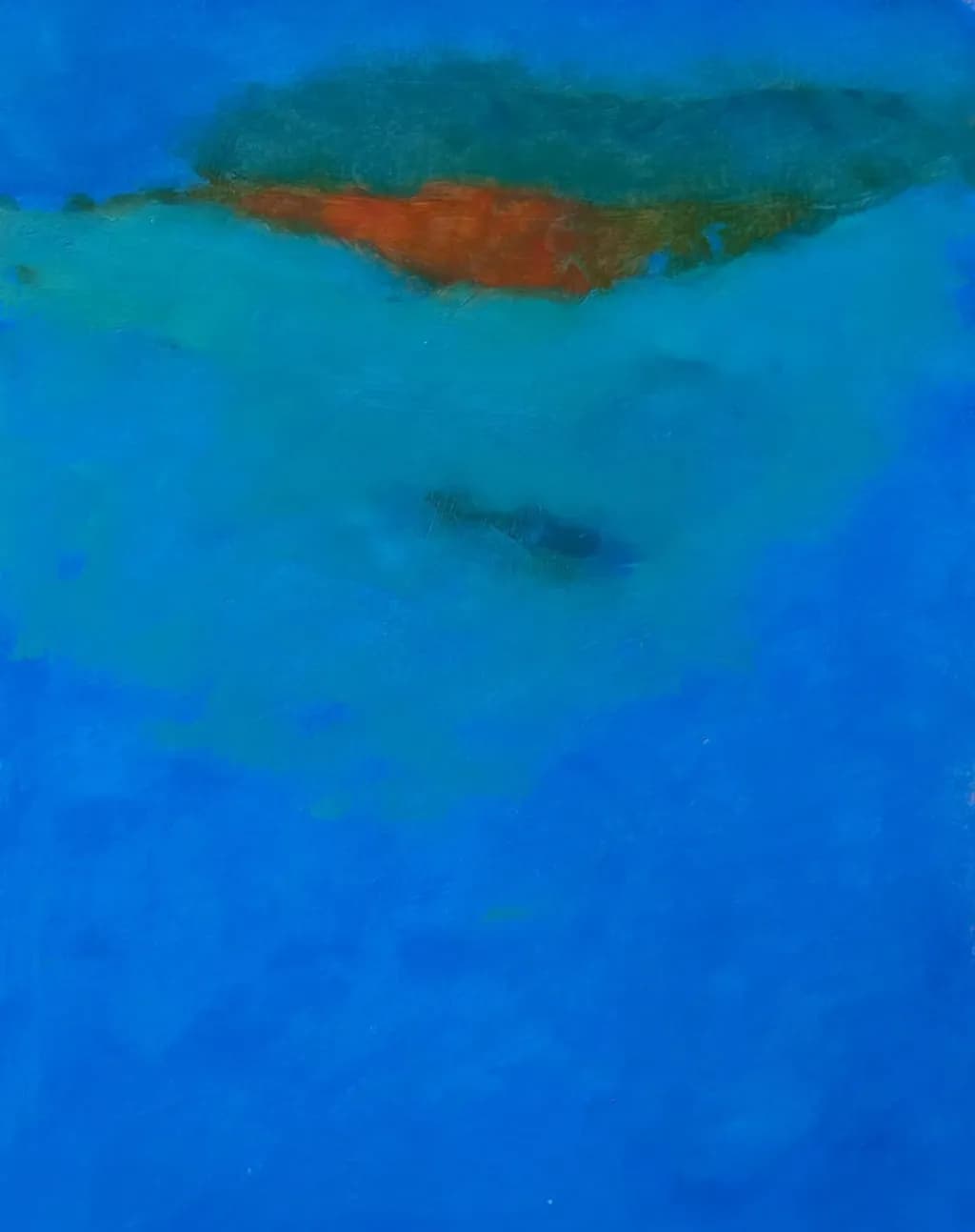 Whispers of the Ocean: A Serene Blue Horizon with Hints of Warmth
