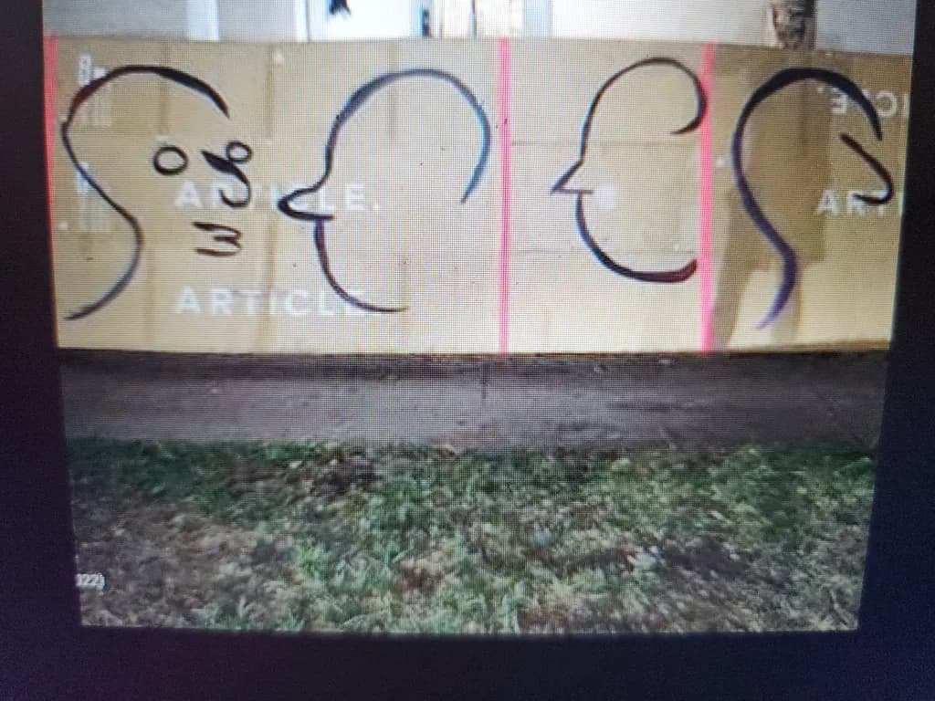 Whispers of Expression: A Minimalist Exploration of Human Forms in Urban Art