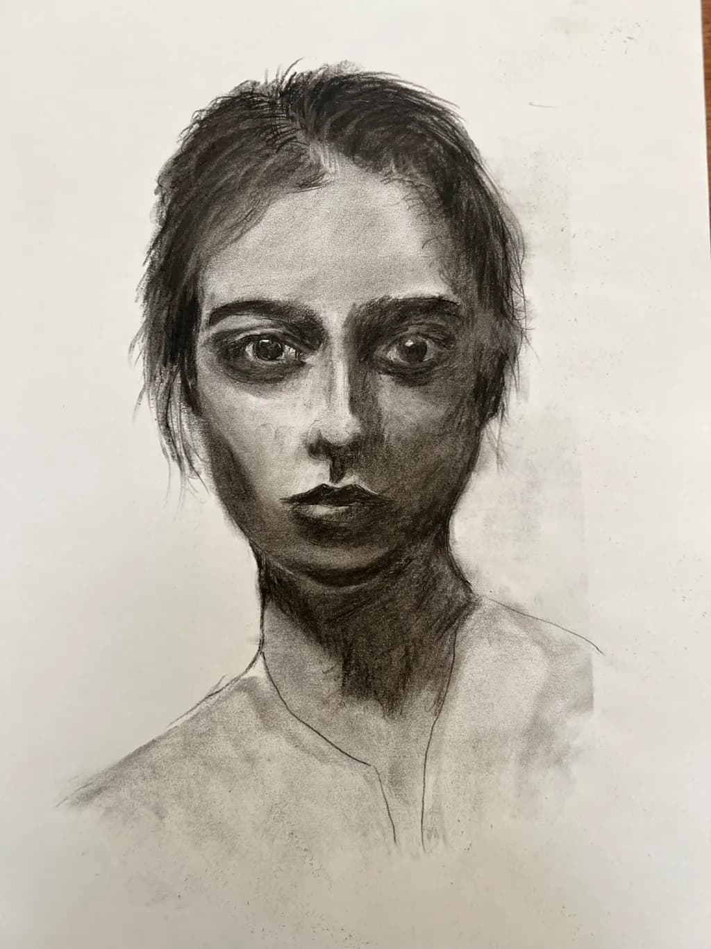 Whispers of Solitude: A Charcoal Portrait of Introspection