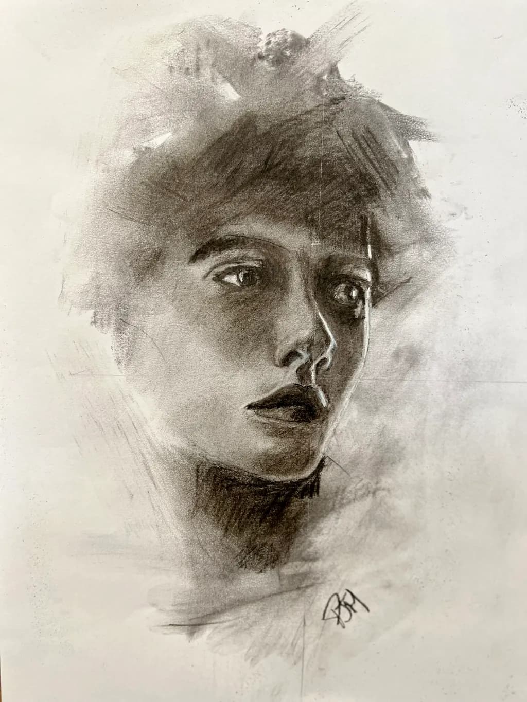 Whispers of Emotion: A Charcoal Portrait of Contemplation
