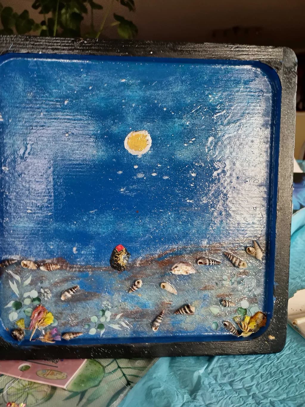 Ocean's Embrace: A Serene Night Under the Moonlit Sky with Shells and Nature's Beauty