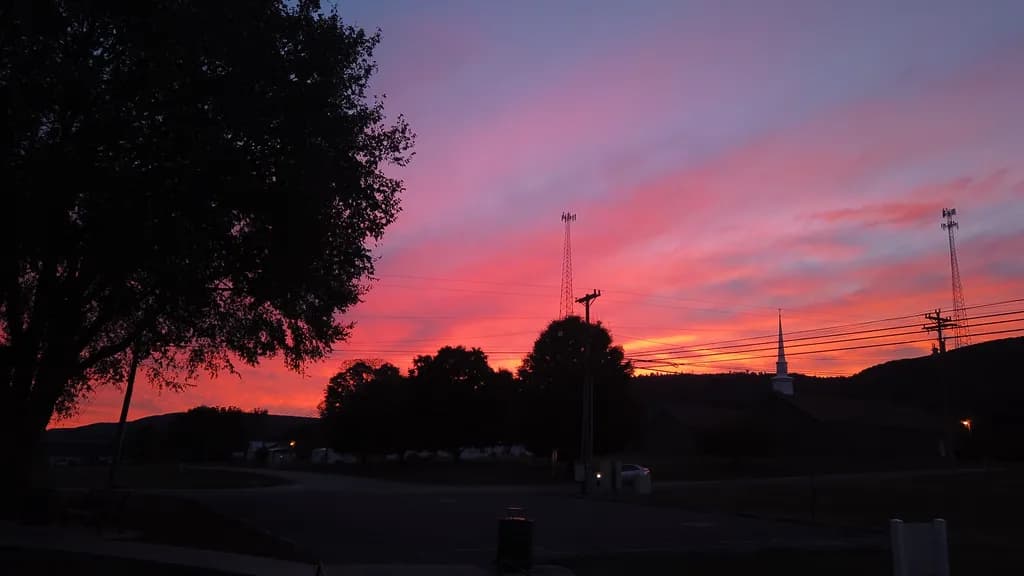 Whispers of Twilight: A Serene Sunset Silhouette Over Tranquil Skies