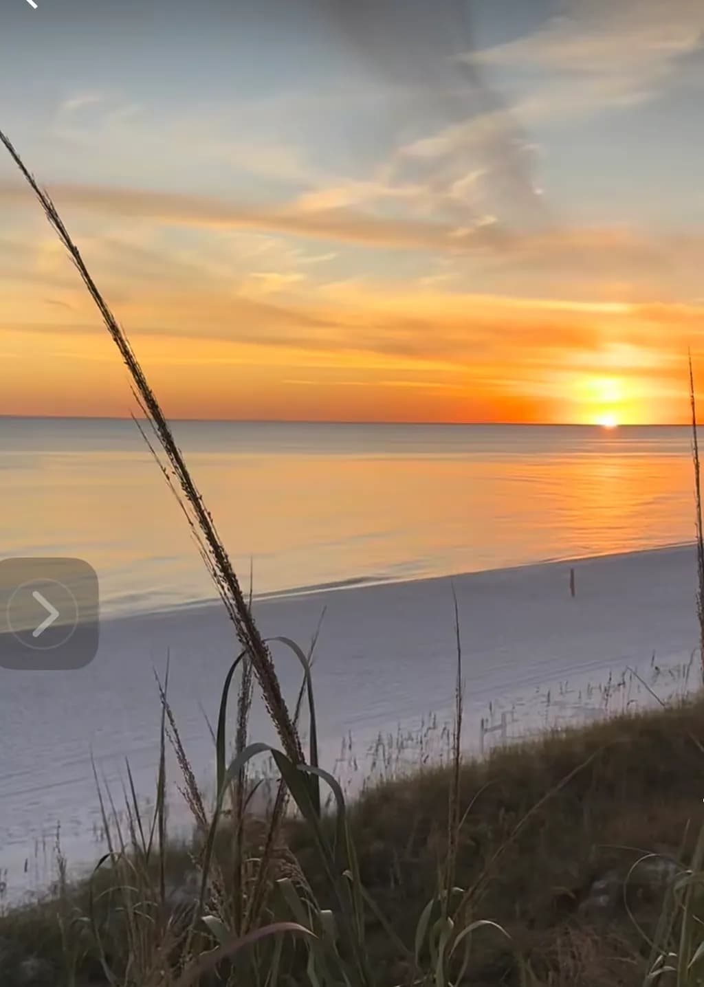 Serene Sunset Over Tranquil Beach: A Scenic Landscape of Peaceful Horizons
