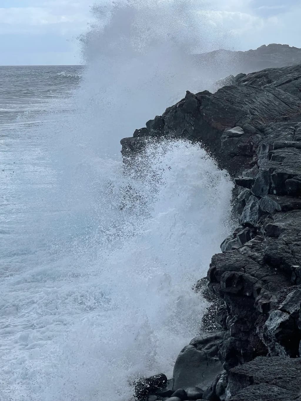 Ocean's Fury: A Dance of Waves and Rocks in Nature's Embrace