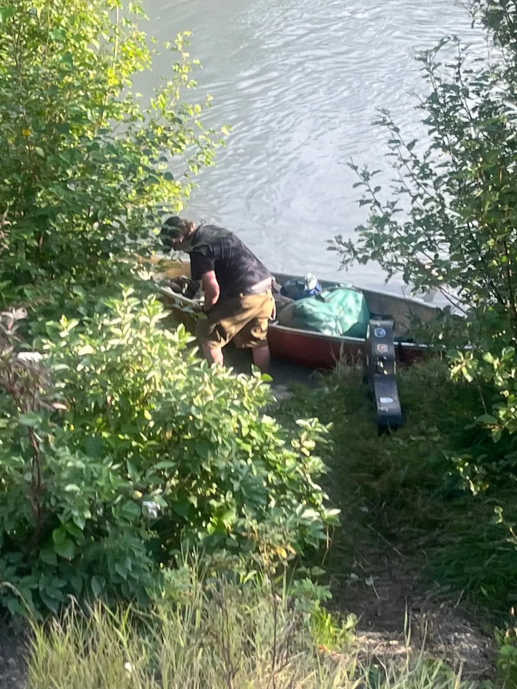 Canoeing Serenity: A Quiet Moment by the Water's Edge