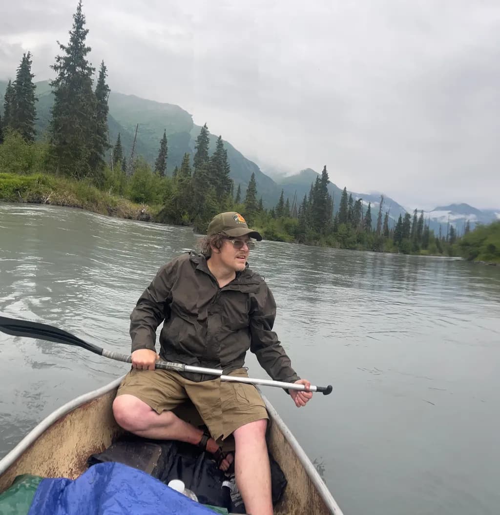 Canoeing Through Nature's Embrace: An Adventure on Serene Waters