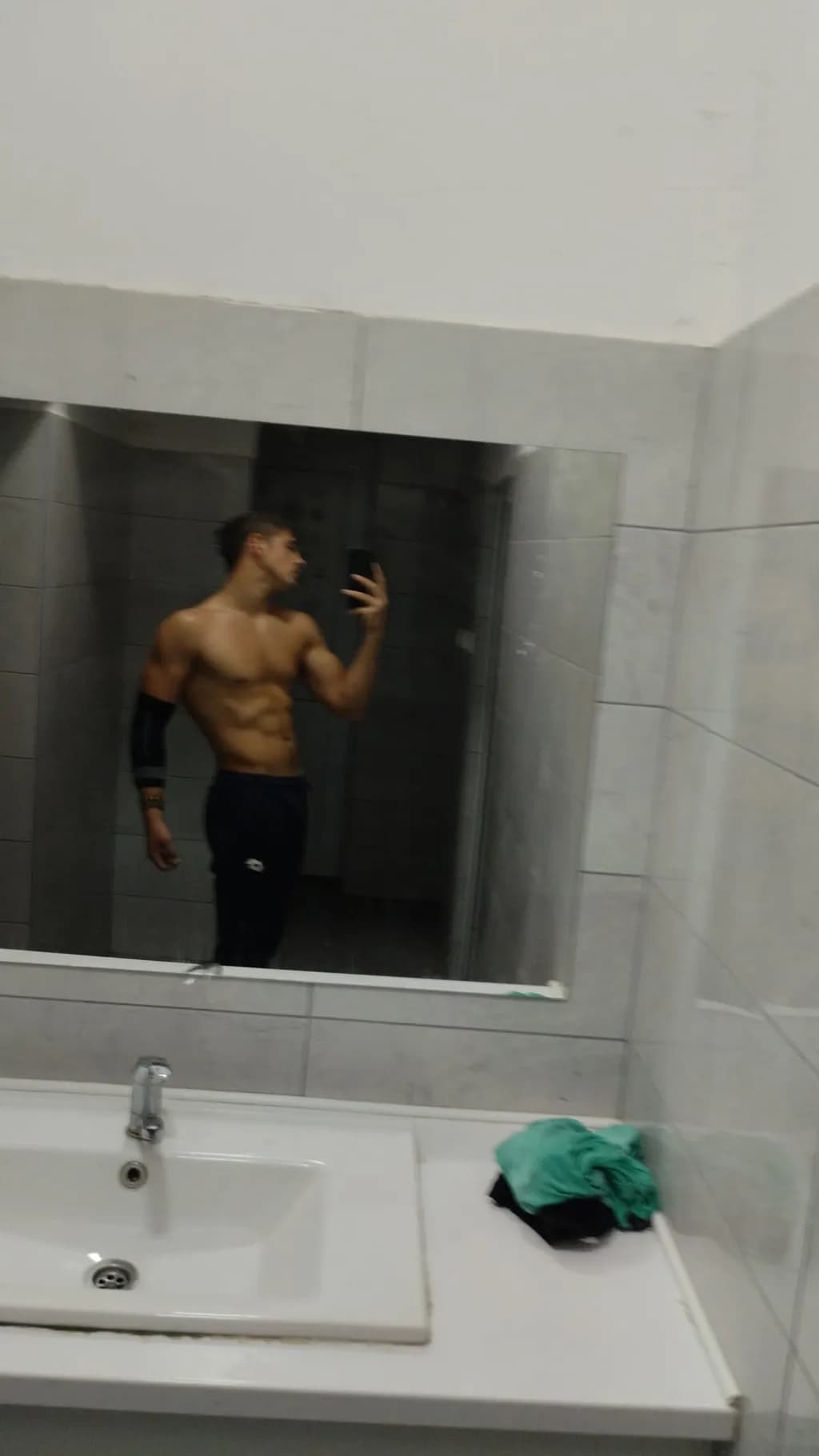 Reflections of Strength: A Bodybuilder's Journey in the Mirror