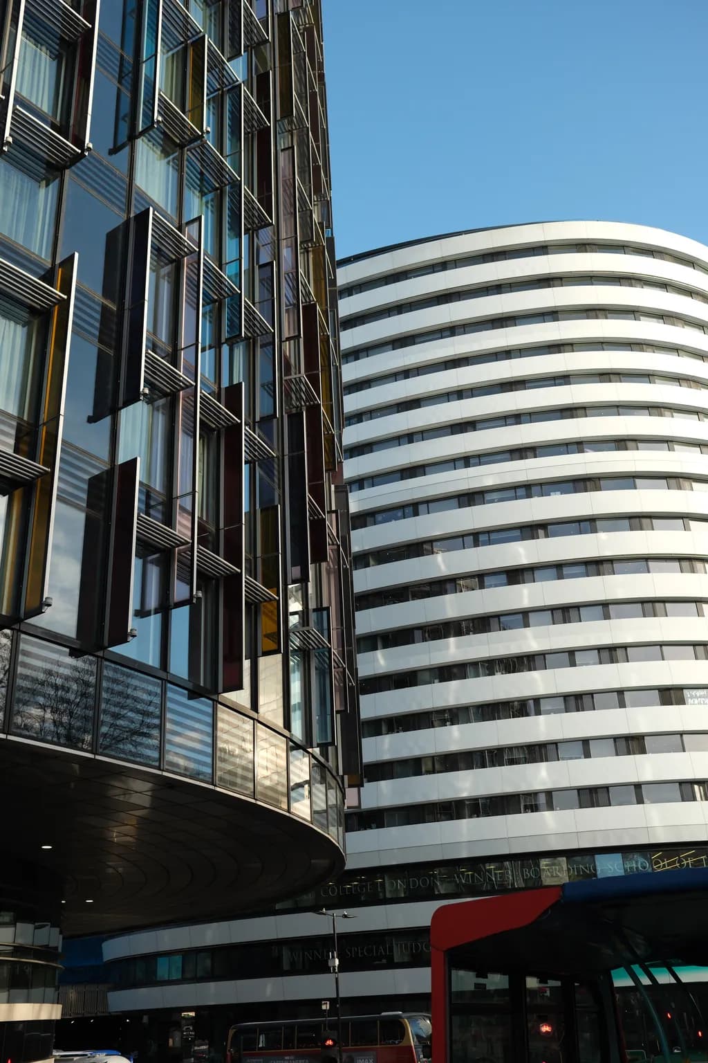 Urban Reflections: A Dance of Glass and Curves in Modern Architecture