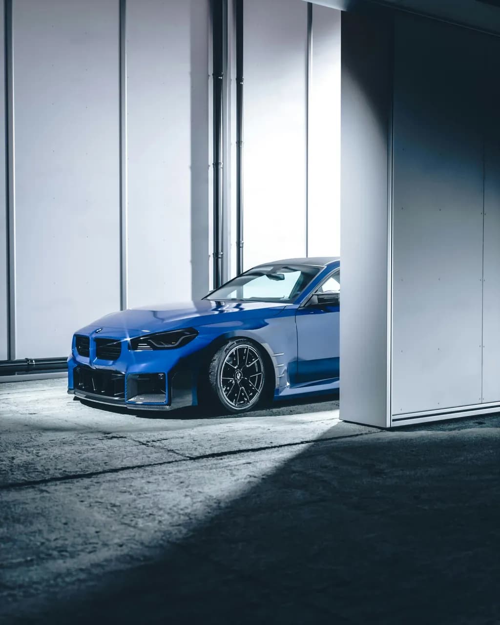 Urban Elegance: A Blue Dream Car in Modern Minimalism