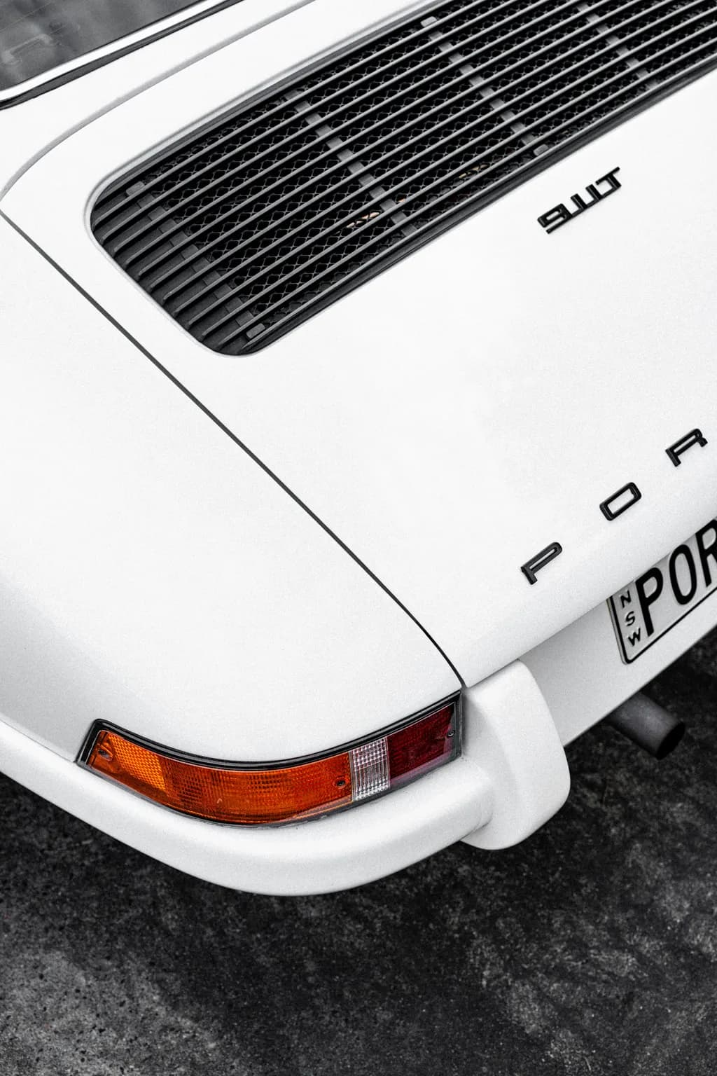 Timeless Elegance: The Iconic Porsche Rear Detail in Monochrome Serenity