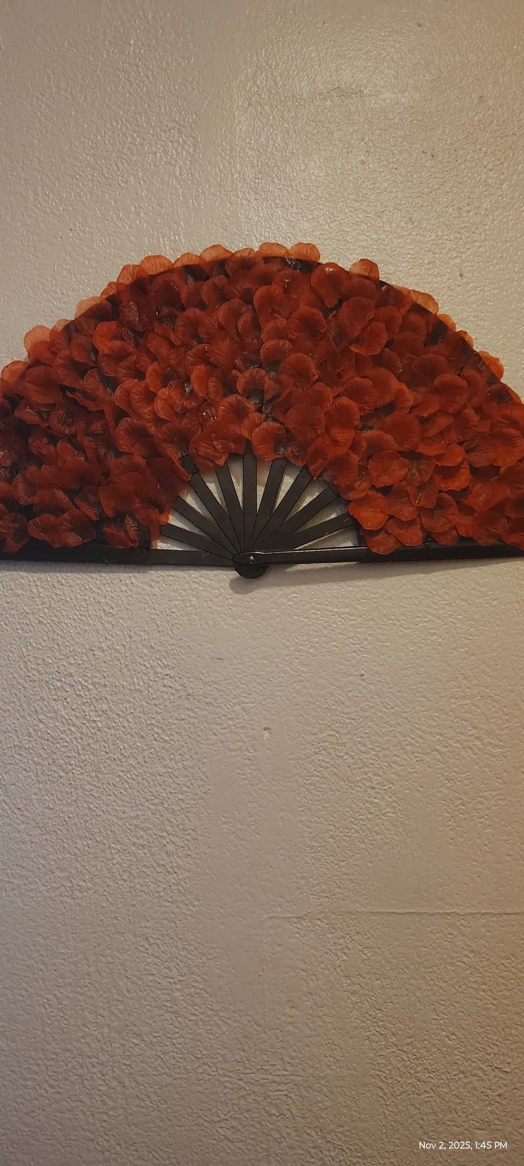 Whispers of Autumn: A Vibrant Red Floral Fan Artistry