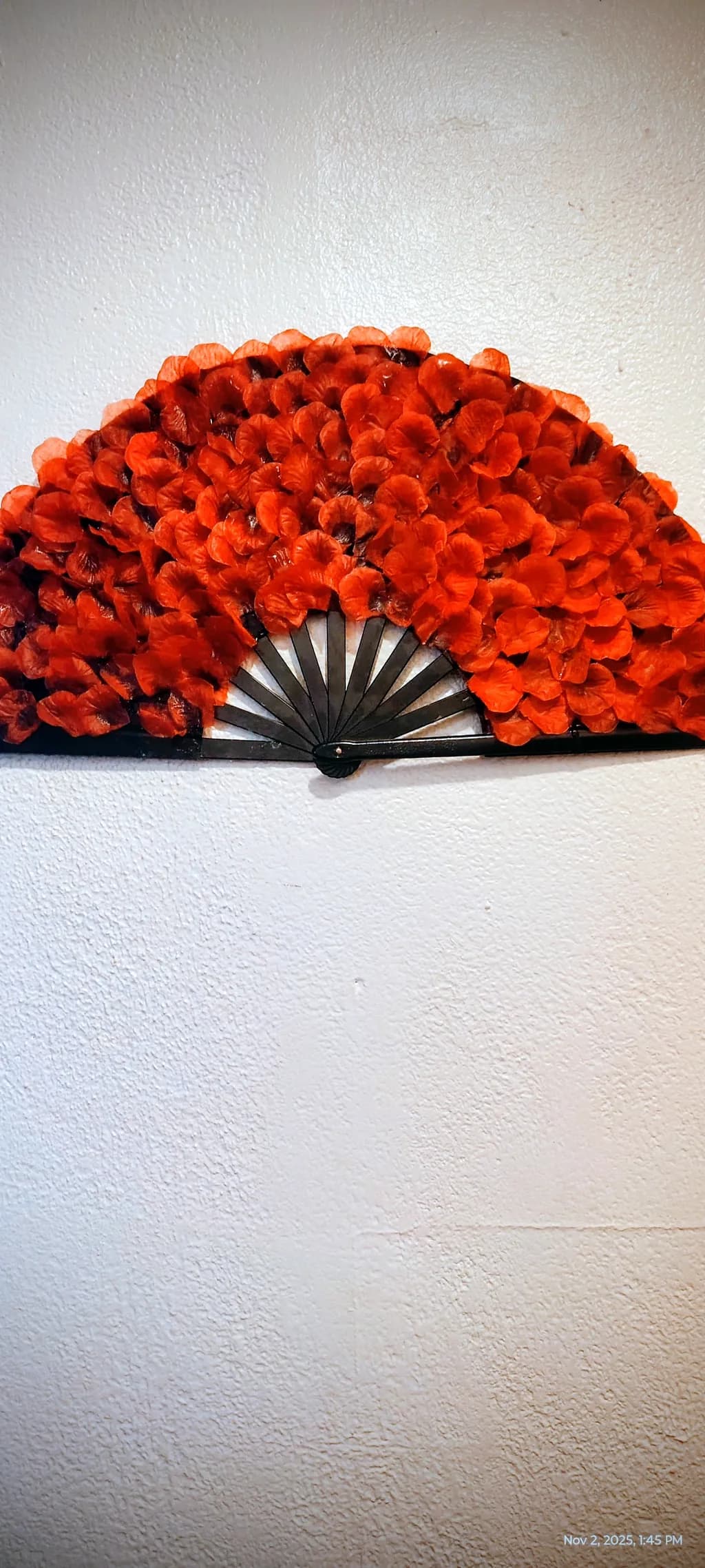 Whispers of Crimson: A Floral Fan Artistry in Red Elegance