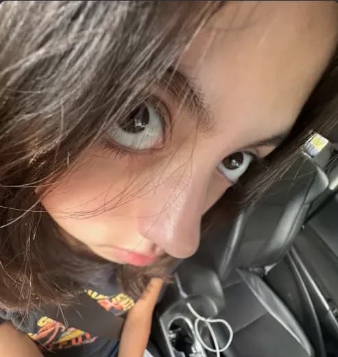 Curious Gaze: A Close-Up Portrait in Motion