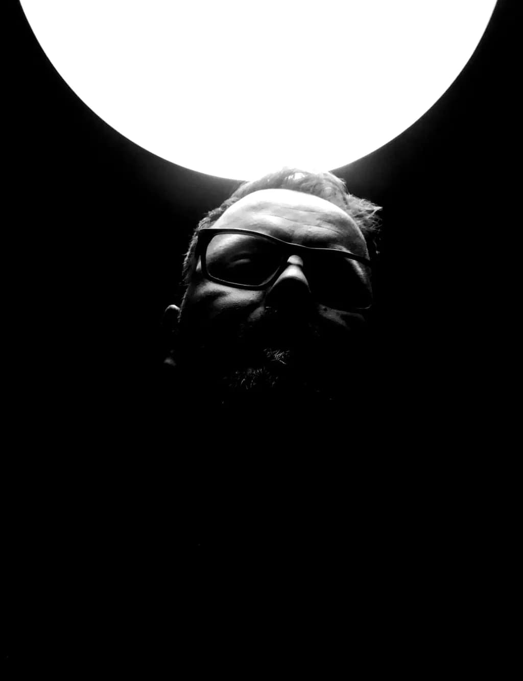 Illuminated Shadows: A Portrait of Duality in Black and White