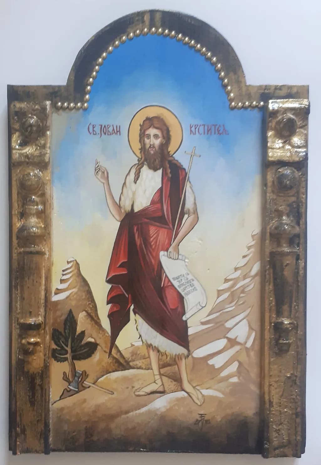 Divine Messenger: The Iconic Presence of St. John the Baptist in a Serene Landscape