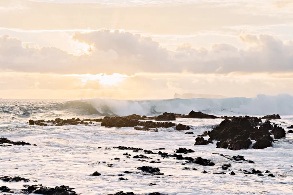 Whispers of the Ocean: A Serene Sunset Over Rocky Shores